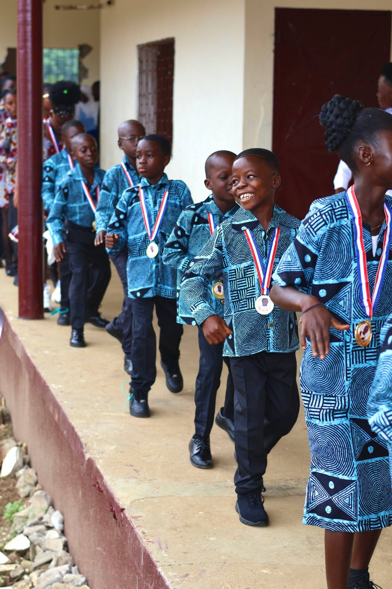 Pupils celebrating with medals